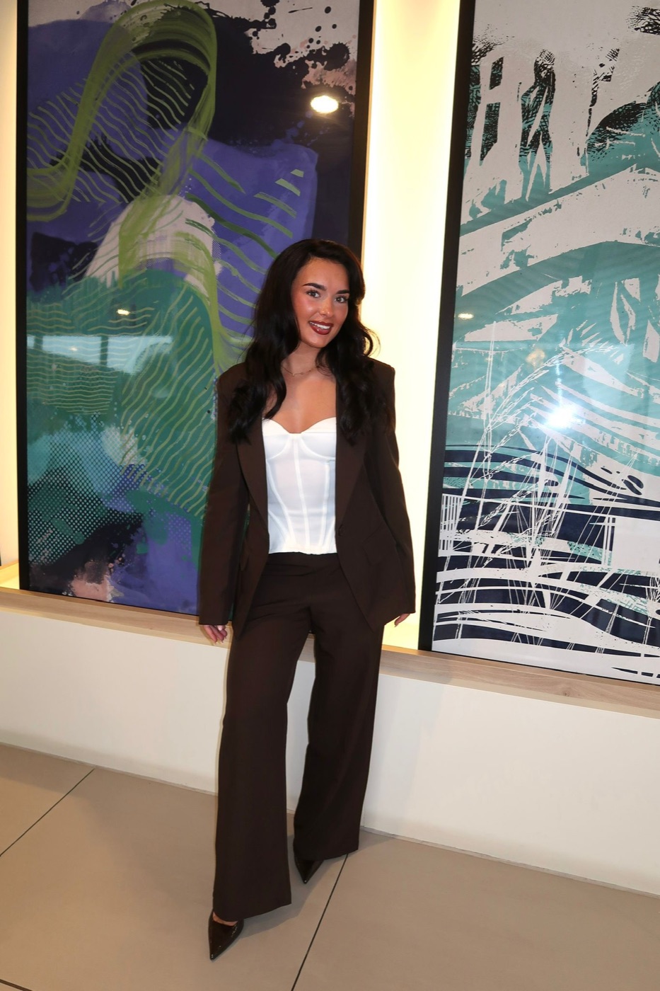 Elle, Co-Founder of The Mindset Miles Group, travel business mentor and community builder