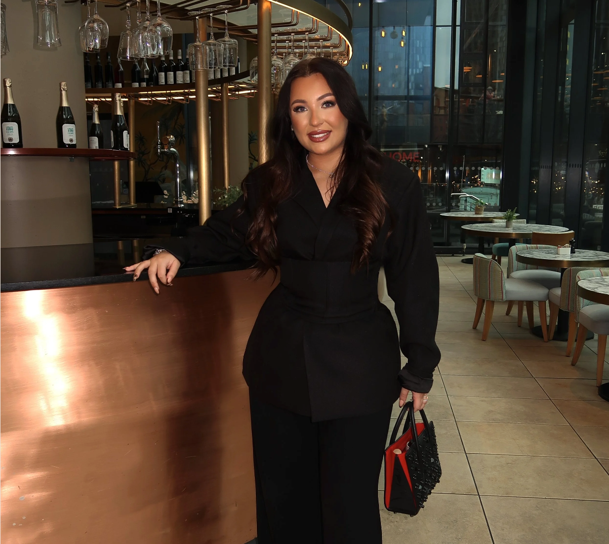 Tia, Co-Founder of The Mindset Miles Group, home-based travel business entrepreneur